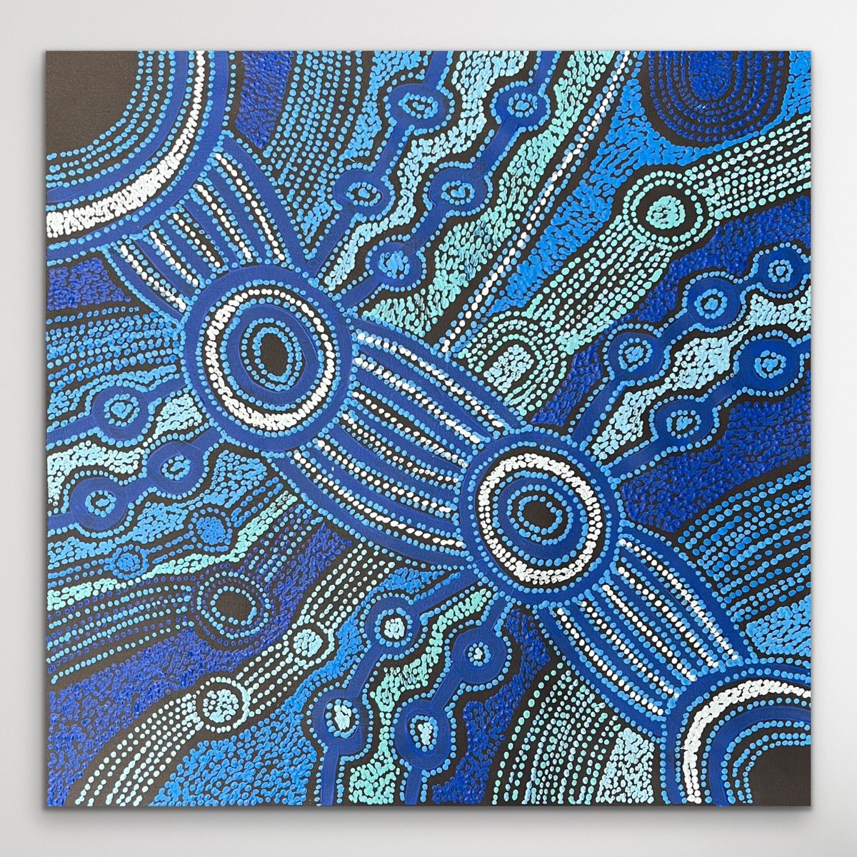 Minyma Malilu painting with blue and black patterns on a black background
