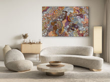 Load image into Gallery viewer, Modern living room with a textured sofa, round coffee table, and Aboriginal art by Janet Golder Kngwarreye from Utopia
