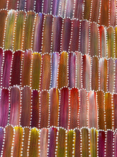 Load image into Gallery viewer, Colorful Jeannie Mills Pwerle Yam Dreaming authentic Indigenous Australian artwork 150cm x 97cm with vertical stripes in various shades of red, orange, yellow, and purple.
