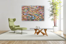 Load image into Gallery viewer, Modern living room with a green armchair, wooden table, and colorful Jeannie Mills painting on a white wall.
