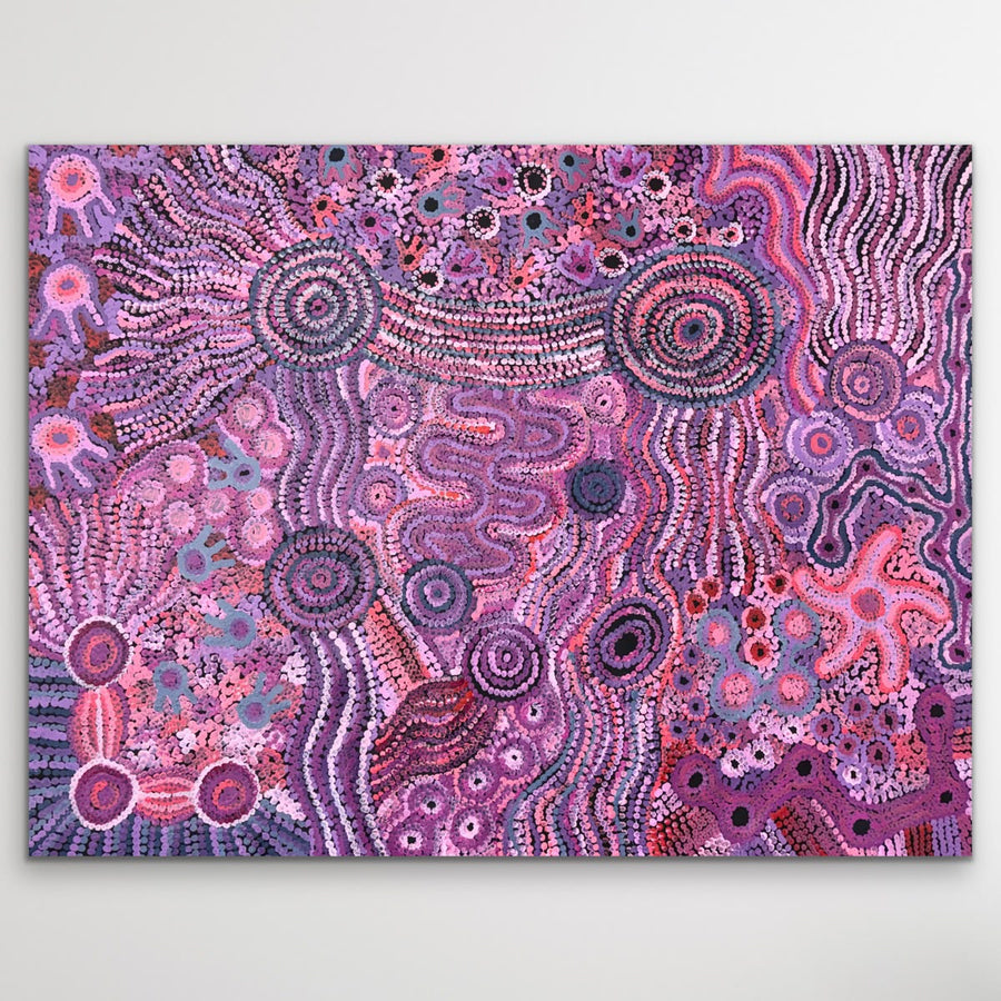 Full view of Mamungari Nya, an original Aboriginal artwork by Renae Nakamarra Nelson featuring detailed dot work, circular patterns and flowing designs in pink, purple, red and white.