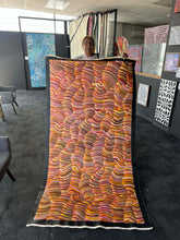 Load image into Gallery viewer, Maureen Hudson holding "Sand Dunes (Tali)" Maureen Nampijinpa Hudson 200cm x 104cm
