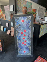 Load image into Gallery viewer, Maureen Hudson holding seven sisters painting
