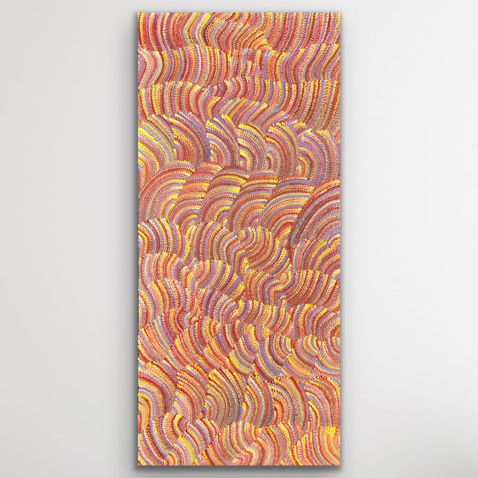 Tall canvas of Sand Dunes Tali artwork painted by Maureen Nampijinpa Hudson