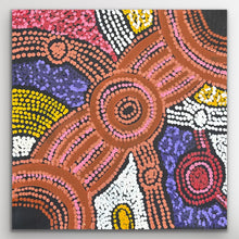 Load image into Gallery viewer, Close-up showing the central circular motif and vibrant dot work from Clarise Tunkin’s Minma Maliilu painting.
