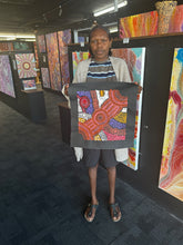 Load image into Gallery viewer, Photo of Clarise Tunkin’s painting displayed in-hand, showing texture, palette and scale
