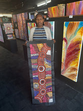 Load image into Gallery viewer, Photo of Minma Malilu held inside a gallery space showing colours and overall scale.
