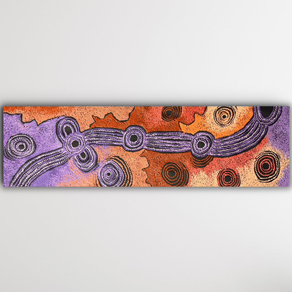 Full landscape image of Teresa Baker’s Minyma Maililu, showing rhythmic dot work and contrasting tones symbolising sacred desert pathways.