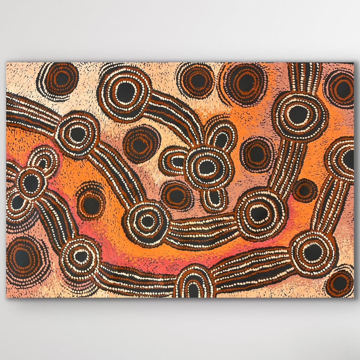 Original Aboriginal painting “Minyma Malilu” by Teresa Baker featuring deep ochre tones and concentric Dreaming symbols