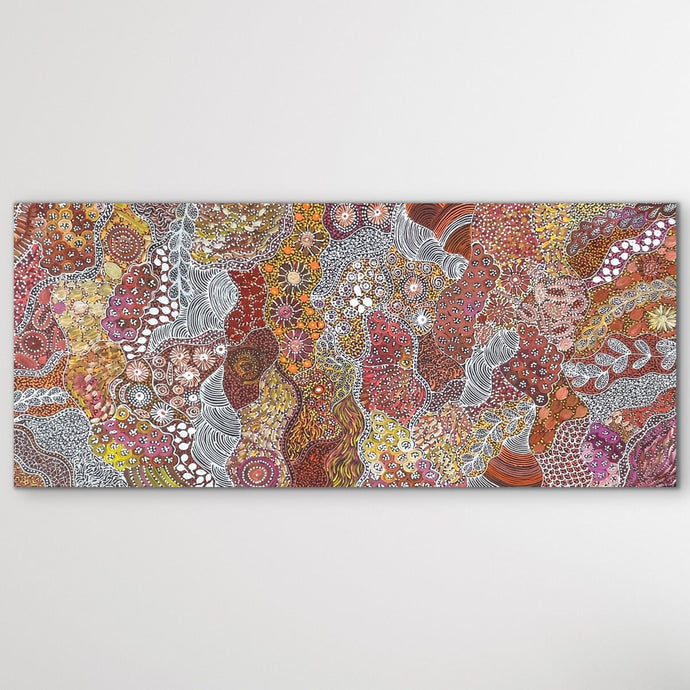 My Country (Utopia) Janet Golder Kngwarreye 201cm x 87cm displayed on white wall vertical with oranges and browns