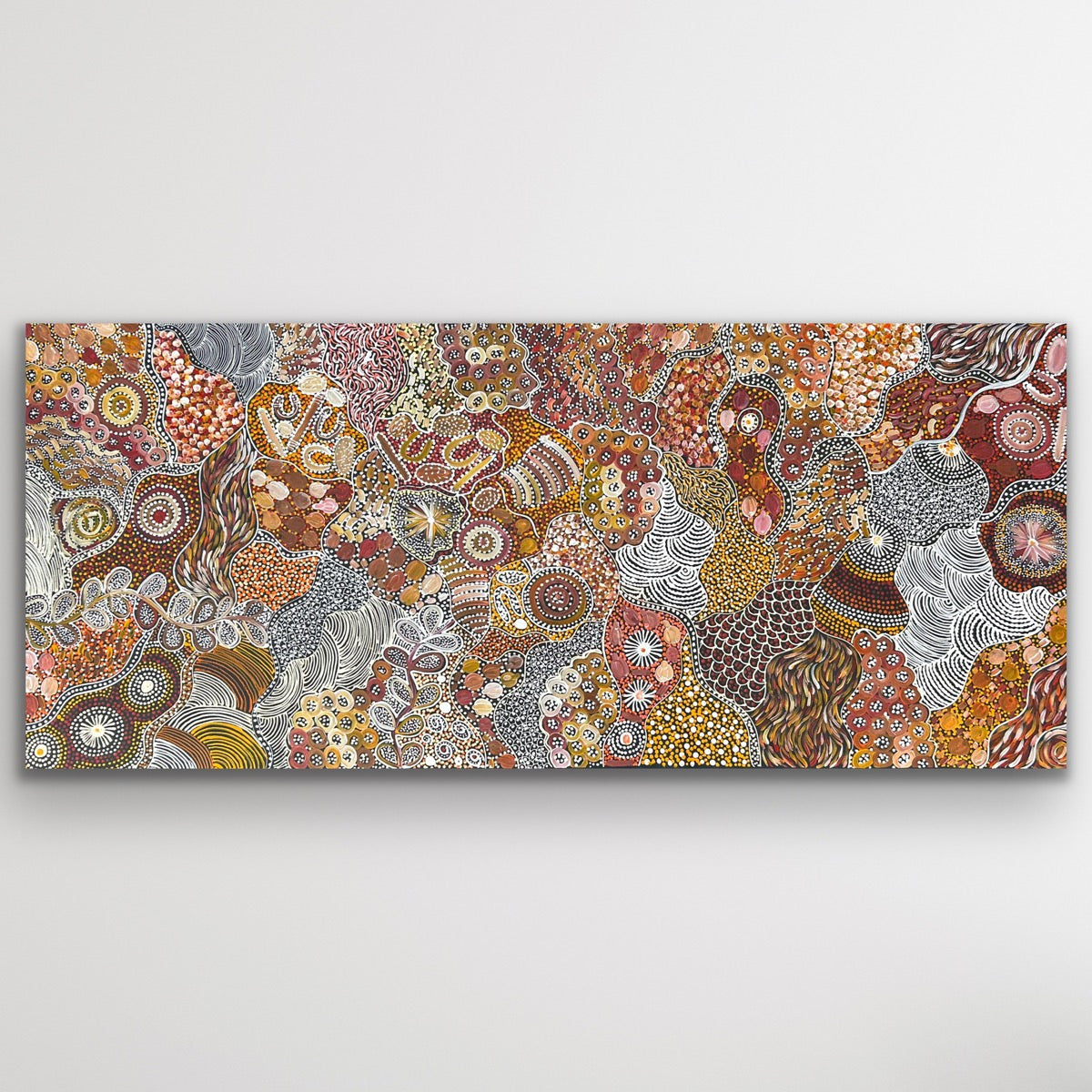 Full view of Janet Golder Kngwarreye’s My Country Utopia painting, showcasing earthy tones and detailed dot work.