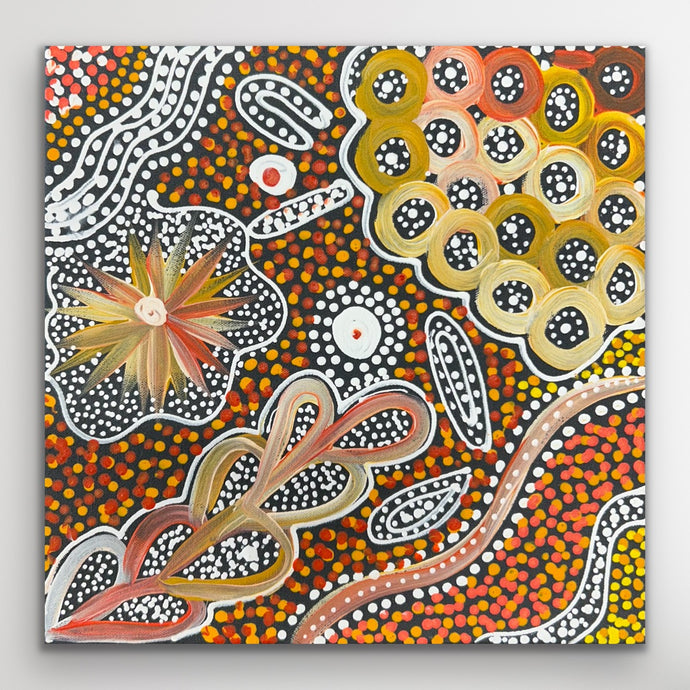 Aboriginal dot painting in earthy orange, yellow, black and white by Janet Golder.