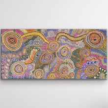 Load image into Gallery viewer, Large Aboriginal artwork with colourful circular forms and pathways representing Country
