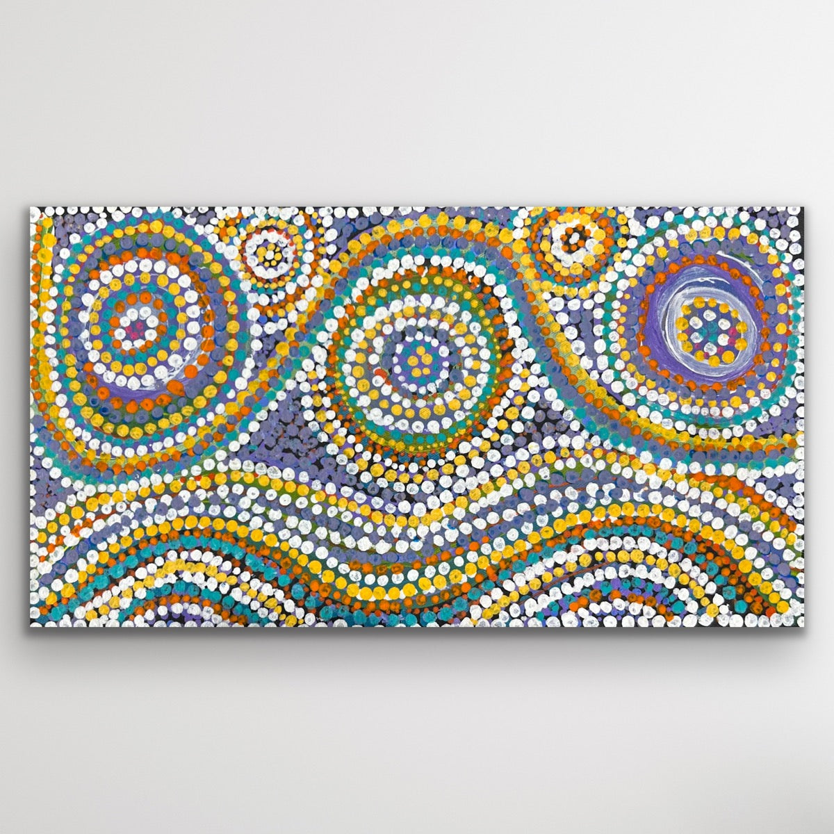 Full artwork view showing circular designs that symbolise sacred waterholes and journeys.