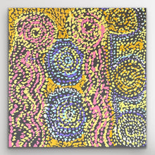 Load image into Gallery viewer, Full view of Piltati Tjukurpa by Rhoda Tjitayi showing dense dot work with circular forms in yellow blue and pink tones.
