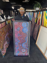 Load image into Gallery viewer, Authentic Aboriginal artwork &#39;Piltati Tjukurpa&#39; by Rhoda Tjitayi shown holding painting, detailed dot painting from APY Lands with Dreamtime story
