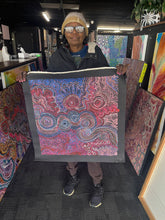 Load image into Gallery viewer, Artist Photo Rhoda Tjitayi Aboriginal artist with her painting &#39;Piltati Tjukurpa,&#39; authentic Indigenous APY Lands Dreamtime dot painting for sale with certificate of authenticity.
