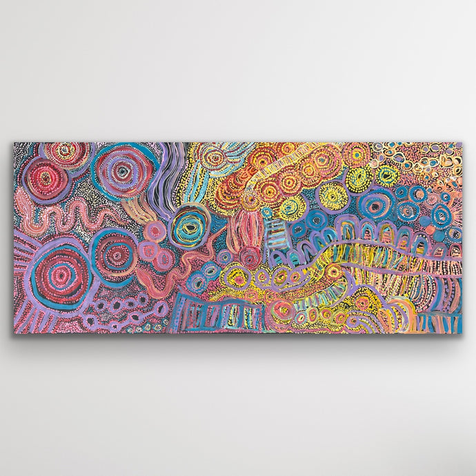 Full image of Pilitati Tjukurpa by Rhoda Tjitayi showing the full composition of circular motifs and flowing pathways in pinks, blues and yellows.