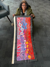 Load image into Gallery viewer, Art photo of Rhoda holding her painting


