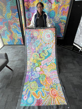 Load image into Gallery viewer, Large canvas stretched across the floor of the Edwardstown gallery before display.
