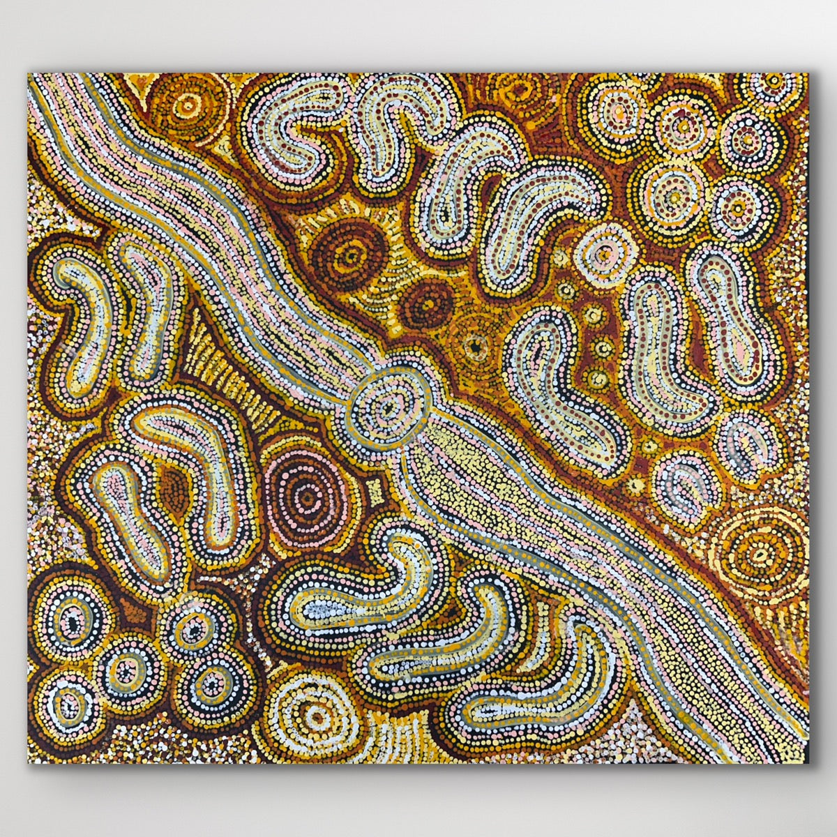 Intricate linework and soft textures illustrate the Seven Sisters Dreaming story through desert landscape forms.