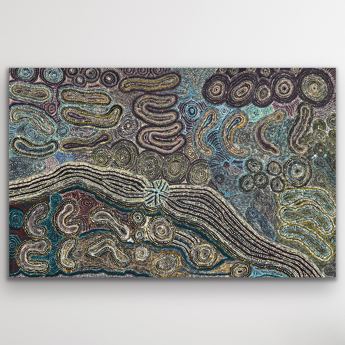 Layers of desert blue, green and ochre ripple across Teresa Pimangka’s Seven Sisters, symbolising the movement of the ancestral story through sky and land.
