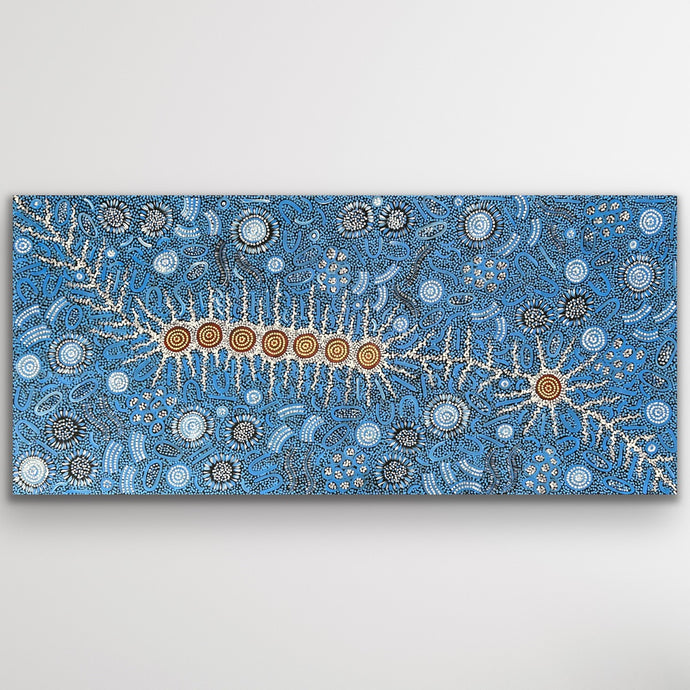 Full view of Michelle Possum Nungurrayi’s Seven Sisters and Women Dancing Ceremony painting showing intricate blue dot work.