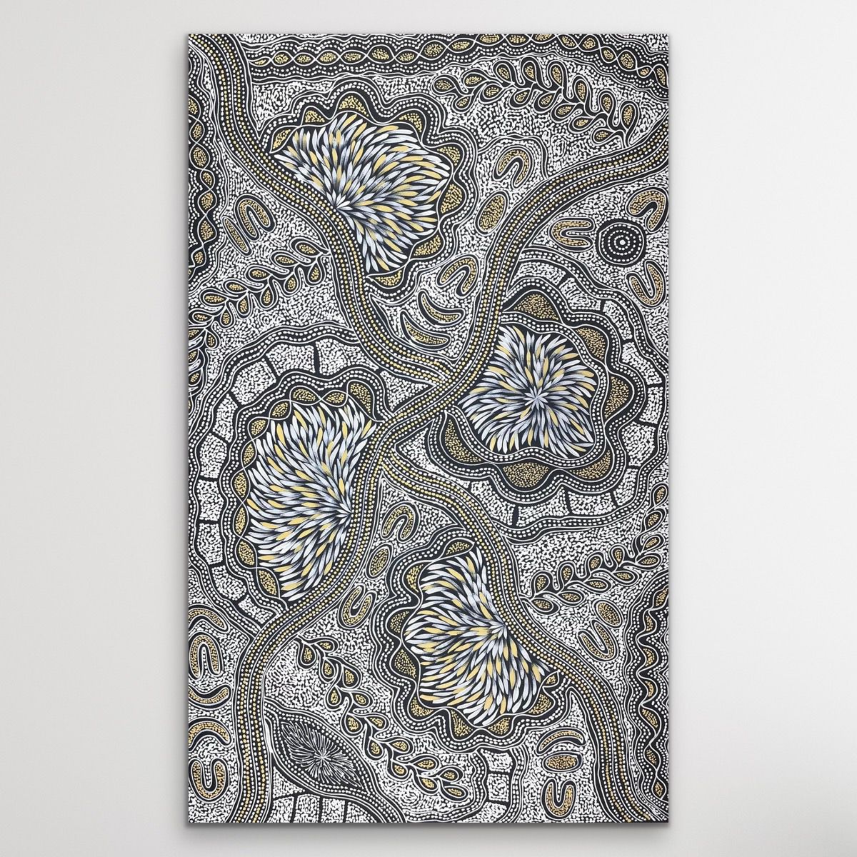 Black, white and cream Aboriginal artwork by Sharon Numina on white wall vertical.