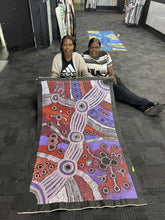 Load image into Gallery viewer, Sisters Sophia and Clarise Tunkin holding painting 
