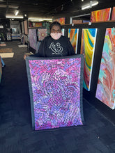 Load image into Gallery viewer, Tansy holding painting
