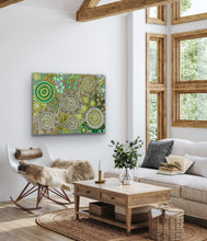 Load image into Gallery viewer, Budgerigar Dreaming Wild Green Country Aboriginal print displayed in a bright living room interior
