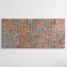 Load image into Gallery viewer, Yam Dreaming rainbow Aboriginal painting by Jeannie Mills Pwerle displayed horizontally on white wall 213cm x 104cm
