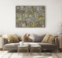 Load image into Gallery viewer, Living room with a decorative painting on the wall above a sofa.
