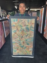 Load image into Gallery viewer, bernadine holding her bush medicine leaves painting
