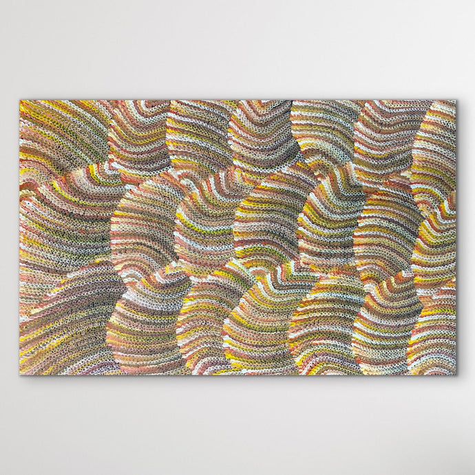 sand dunes painting brown, red, yellow earthy colours displayed on white wall