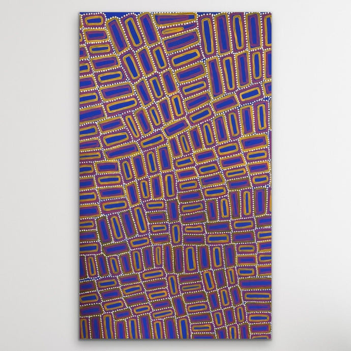 Tingari cultural Aboriginal story geoemtric shapes in yellow, red and vibrant ultramarine blue, with white dots