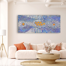 Load image into Gallery viewer, Seven sisters dreamtime painting above a white sofa with orange and pink cushions in a living room.

