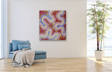 Load image into Gallery viewer, Colorful Farron Furber Jampitjinpa  painting on a white wall above a blue armchair with a plant in the corner.
