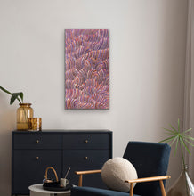 Load image into Gallery viewer, Abstract wavy sand dunes painting on a wall above a black dresser with decorative items.
